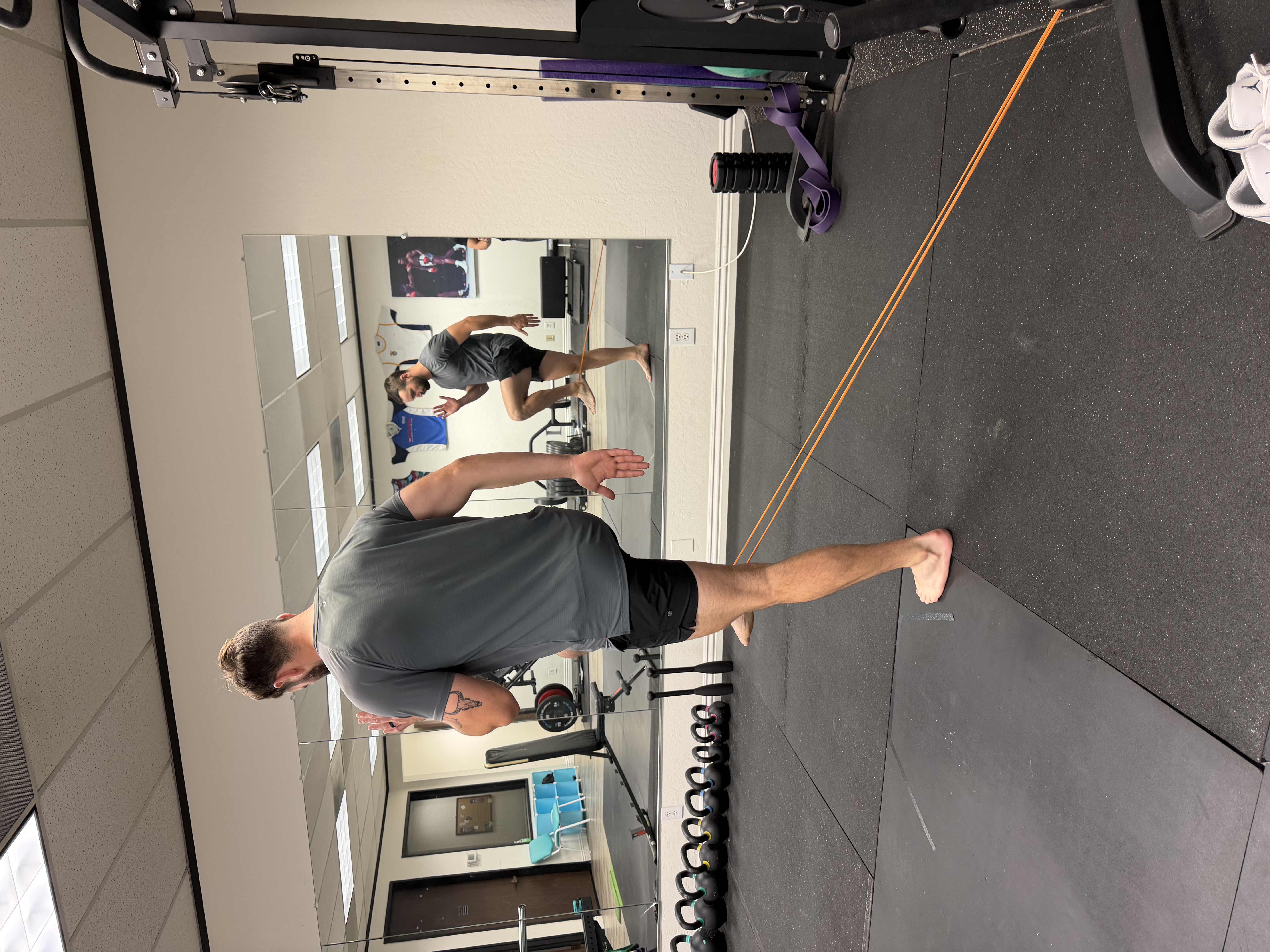 Dr. Mike coaching a patient through a corrective exercise